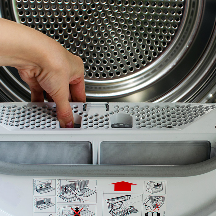 woman-hand-close-up-installing-dryer-machine-fort-collins-co